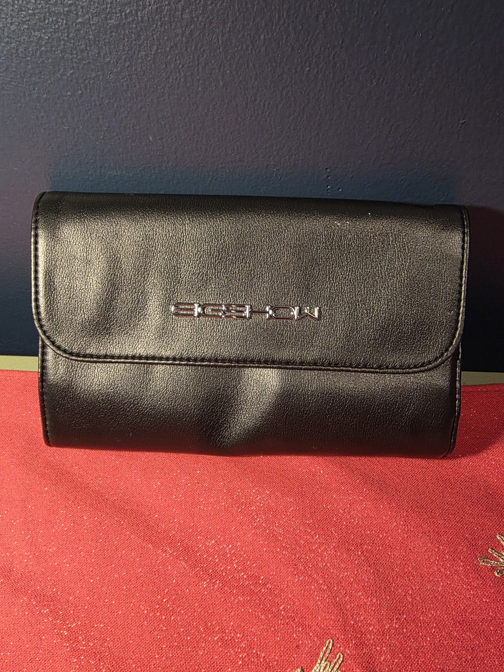 Black Leather Cosmetic Case with Silver Logo Accent
